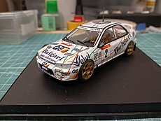 Subaru Impreza 555 - Hachette-0ef1ed8c-8828-4177-849d-0bbd137d35d7.jpg